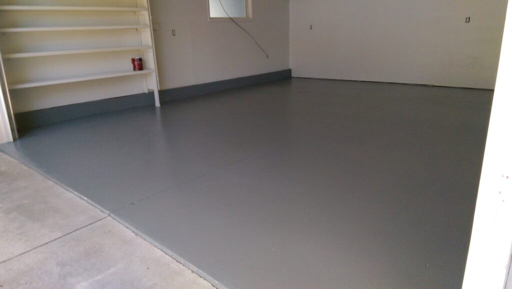 Surface preparation completed before applying protective floor coating.
